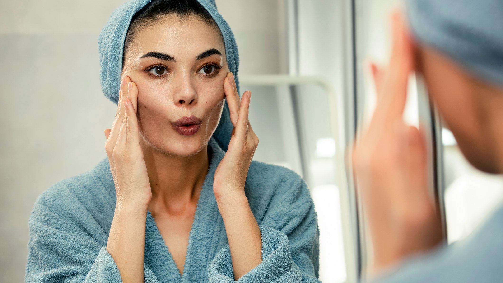 Woman is doing face yoga